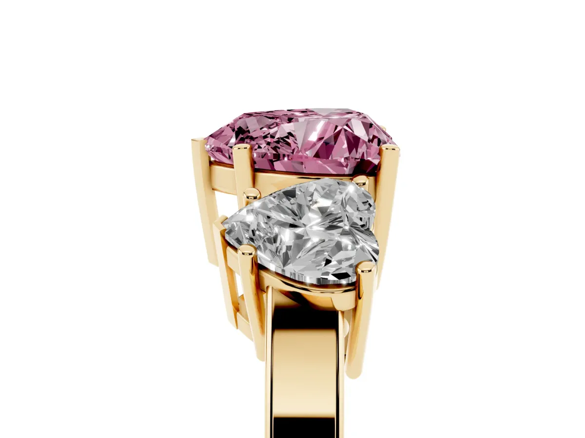 Fancy Pink Three-Stone Heart Cut Cut Diamond Engagement Ring with Flat Band and Four-Prong Setting Yellow gold