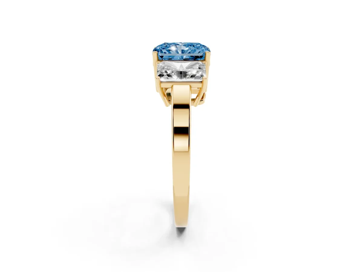 Fancy Blue Three-Stone Radiant Cut Cut Diamond Engagement Ring with Flat Band and Four-Prong Setting Yellow gold