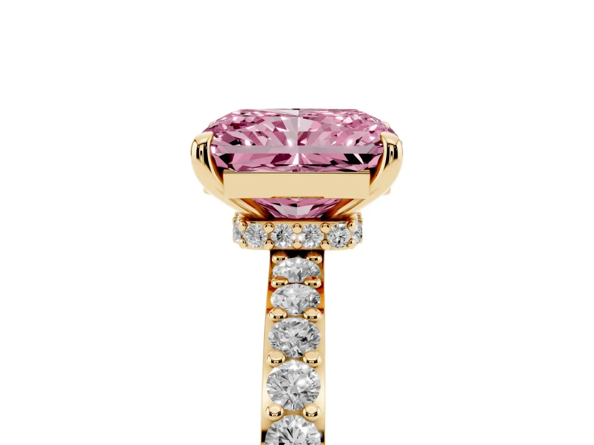Fancy Pink Radiant Cut Diamond Pavé Engagement Ring with Round Accents and Prong Setting Yellow gold