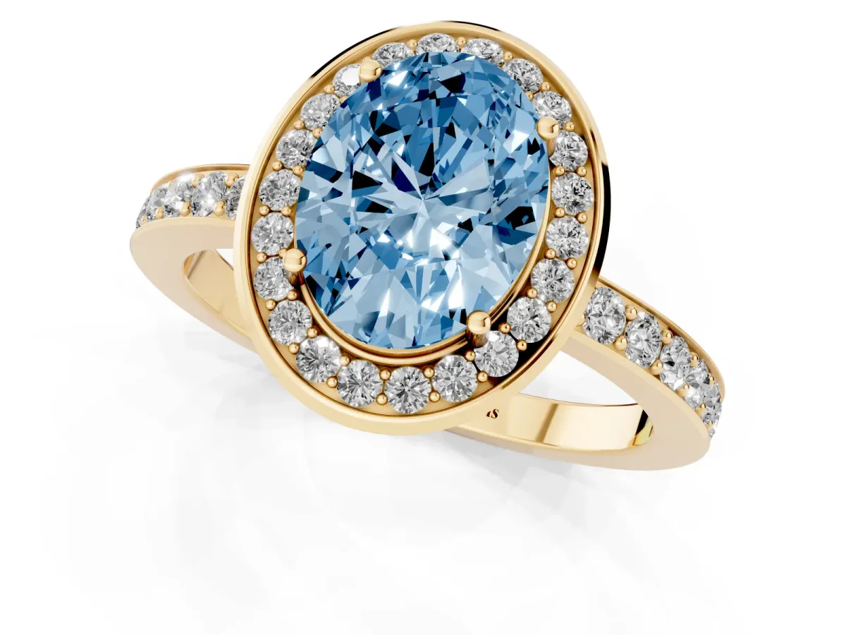 Fancy Blue Oval Cut Diamond Halo Ring with Bezel Frame and Pavé Band Yellow gold