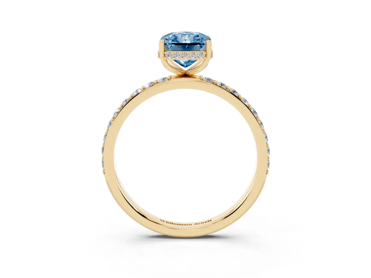 Fancy Blue Radiant Cut Diamond Solitaire Ring with Pavé Band and Hidden Halo Yellow gold