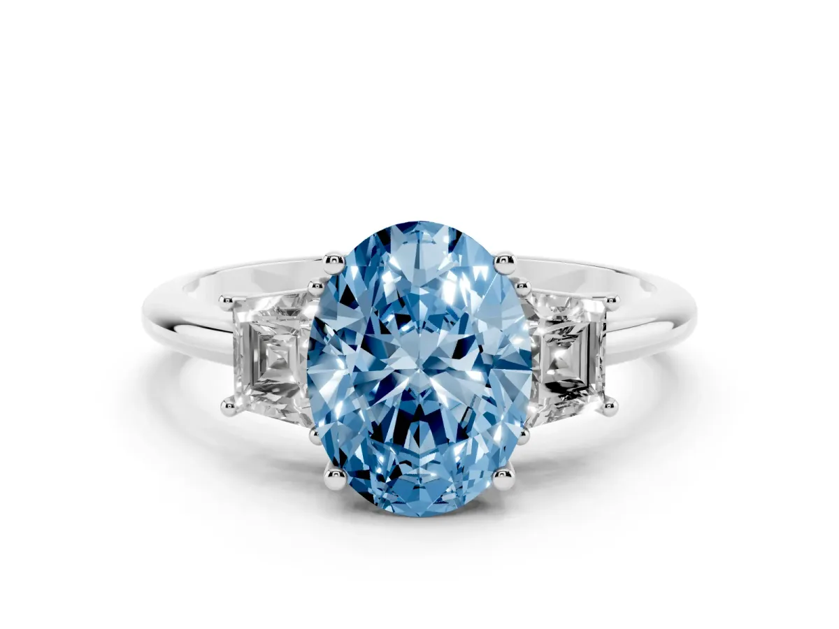 Fancy Blue Oval Cut Diamond Three-Stone Ring with Trapezoid Side Stones and Prong Setting Silver