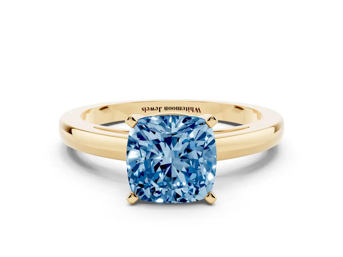 Fancy Blue Cushion Cut Solitaire Diamond Engagement Ring with Four-Prong Setting on a Classic Band Yellow gold