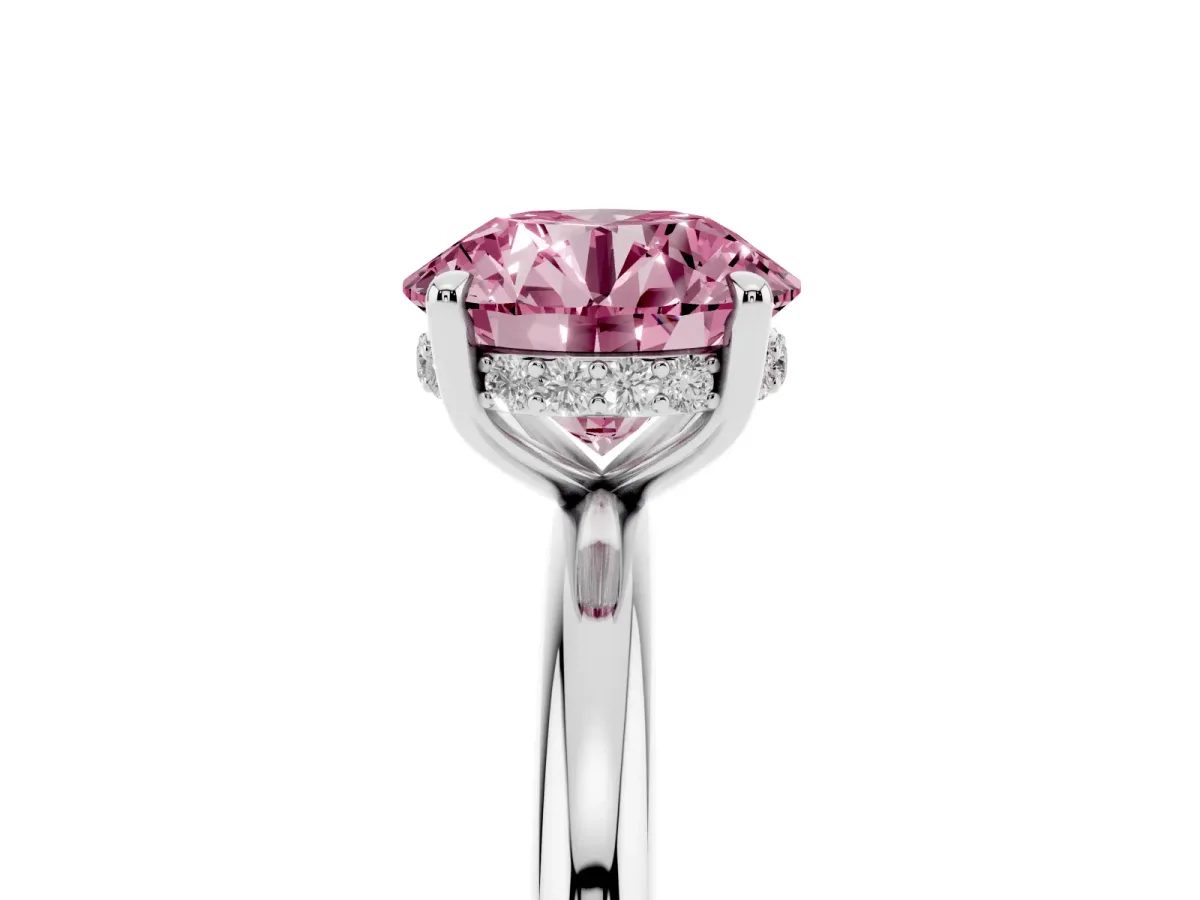 Fancy Pink Round Cut Diamond Solitaire Ring with Thin Band and Four-Prong Setting Silver