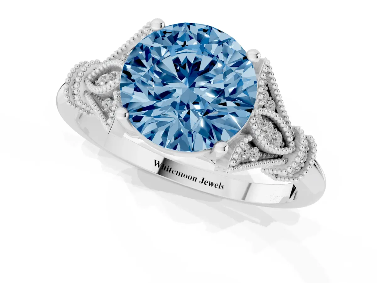 Fancy Blue Round Cut Diamond Solitaire Ring with Floral Filigree and Pave Accents White gold