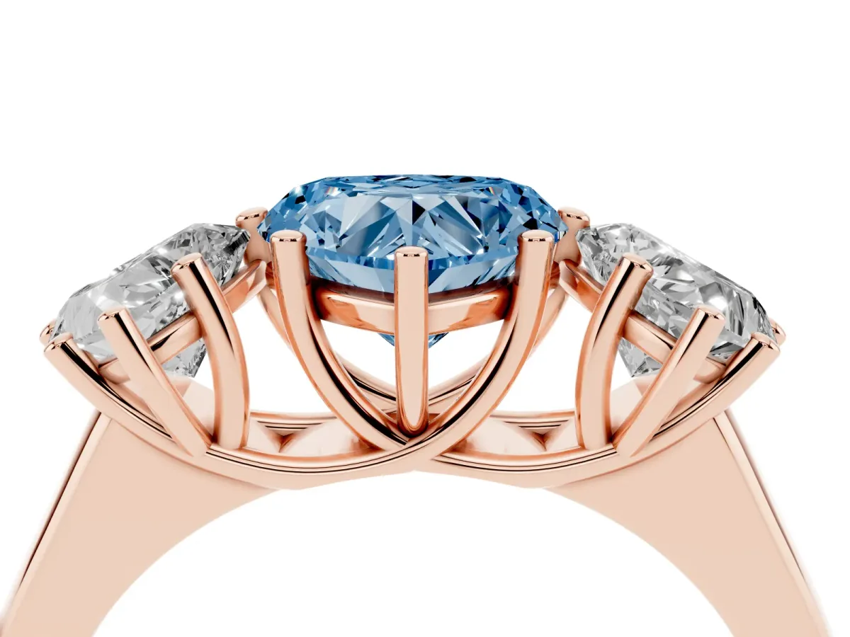 Fancy Blue Heart Cut Three-Stone Diamond Ring with Prong Setting on a Classic Band Rose gold