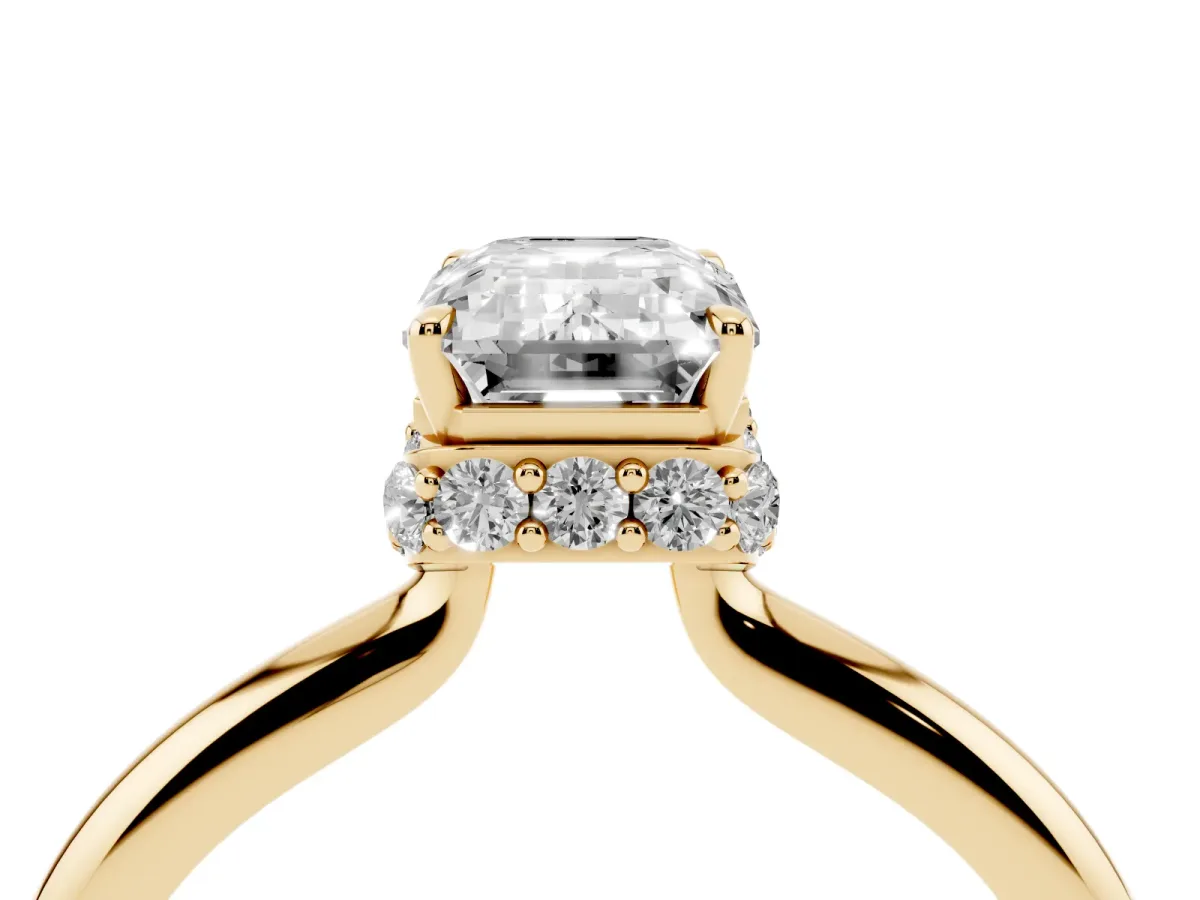 Emerald Cut Brilliant Solitaire Engagement Ring with Six-Prong Setting and Classic Band Yellow gold