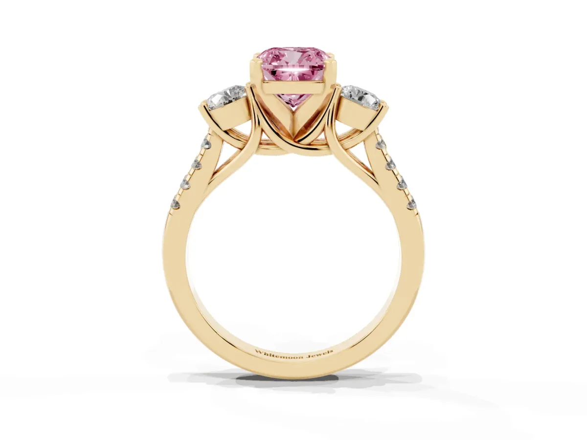 Fancy Pink Three-Stone Cushion Cut Diamond Pavé Band with Four-Prong Setting Yellow gold