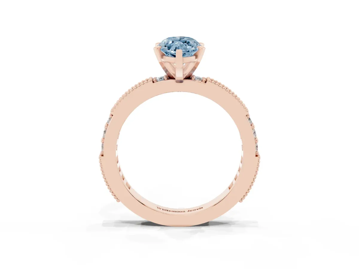 Fancy Blue Marquise Cut Solitaire with Pavé Band and Four-Prong Setting Rose gold
