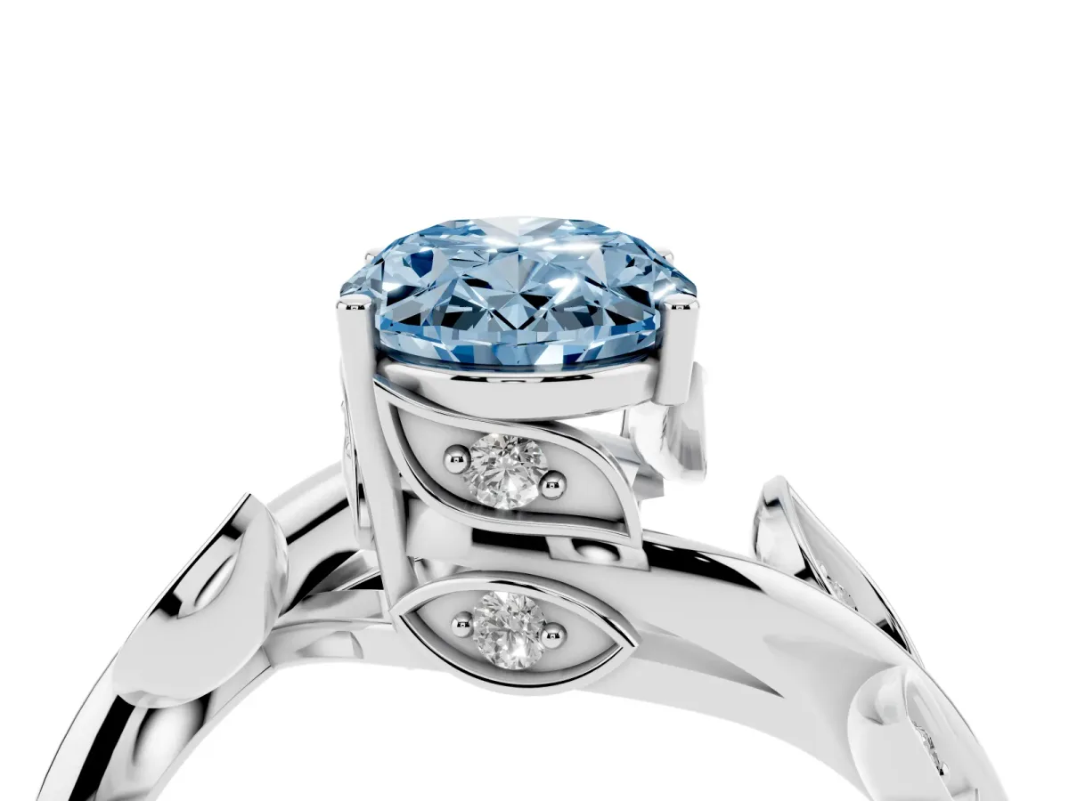 Fancy Blue Oval Cut Solitaire Twist Engagement Ring with Leaf Accents and Prong Setting Silver