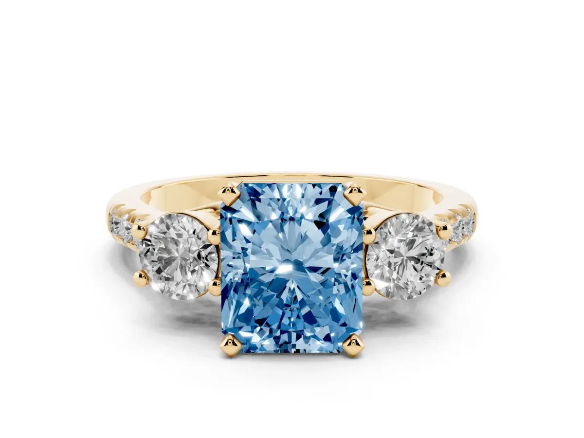 Fancy Blue Three-Stone Radiant Cut Diamond Pavé Band with Four-Prong Setting Yellow gold