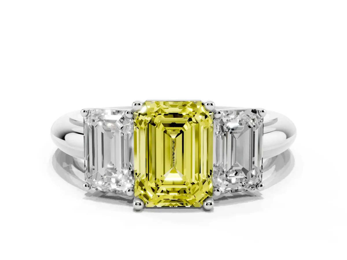 Fancy Yellow Three-Stone Emerald Cut Cut Diamond Engagement Ring with Prong Setting on a White Gold Band Platinum