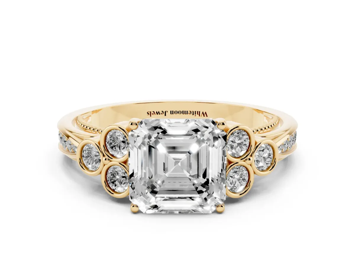 Asscher Cut Cut Diamond Engagement Ring with Bezel Set Round Side Stones and Prong Setting Yellow gold
