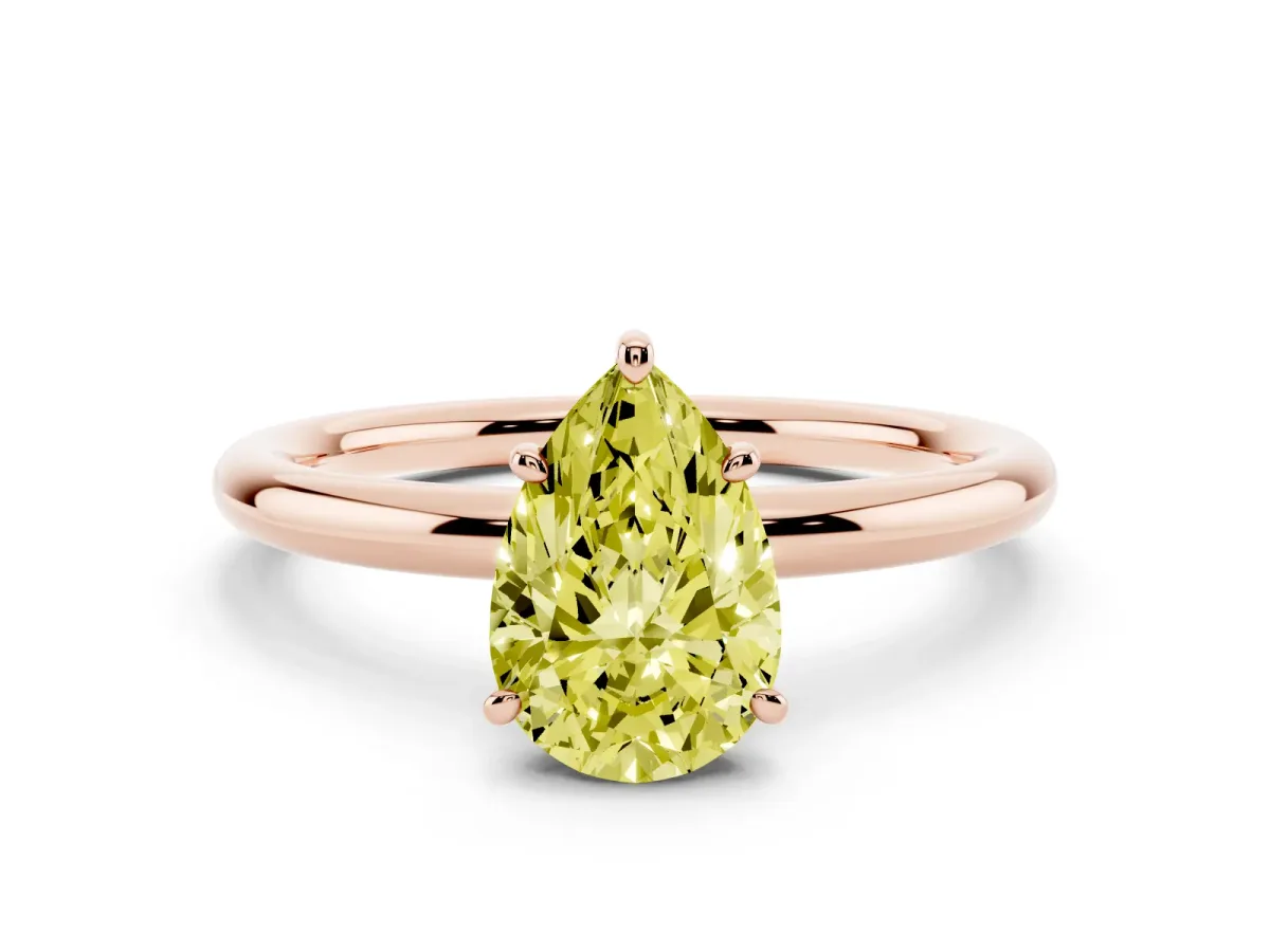 Fancy Yellow Pear Cut Solitaire Diamond Ring with Four-Prong Setting on a Plain Band Rose gold