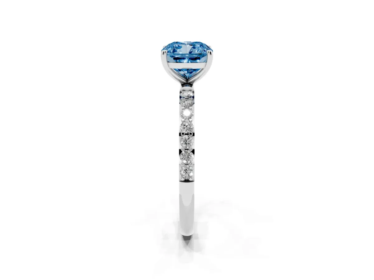 Fancy Blue Cushion Cut Diamond Solitaire Ring with Round Pavé Shoulders and Prong Setting Silver