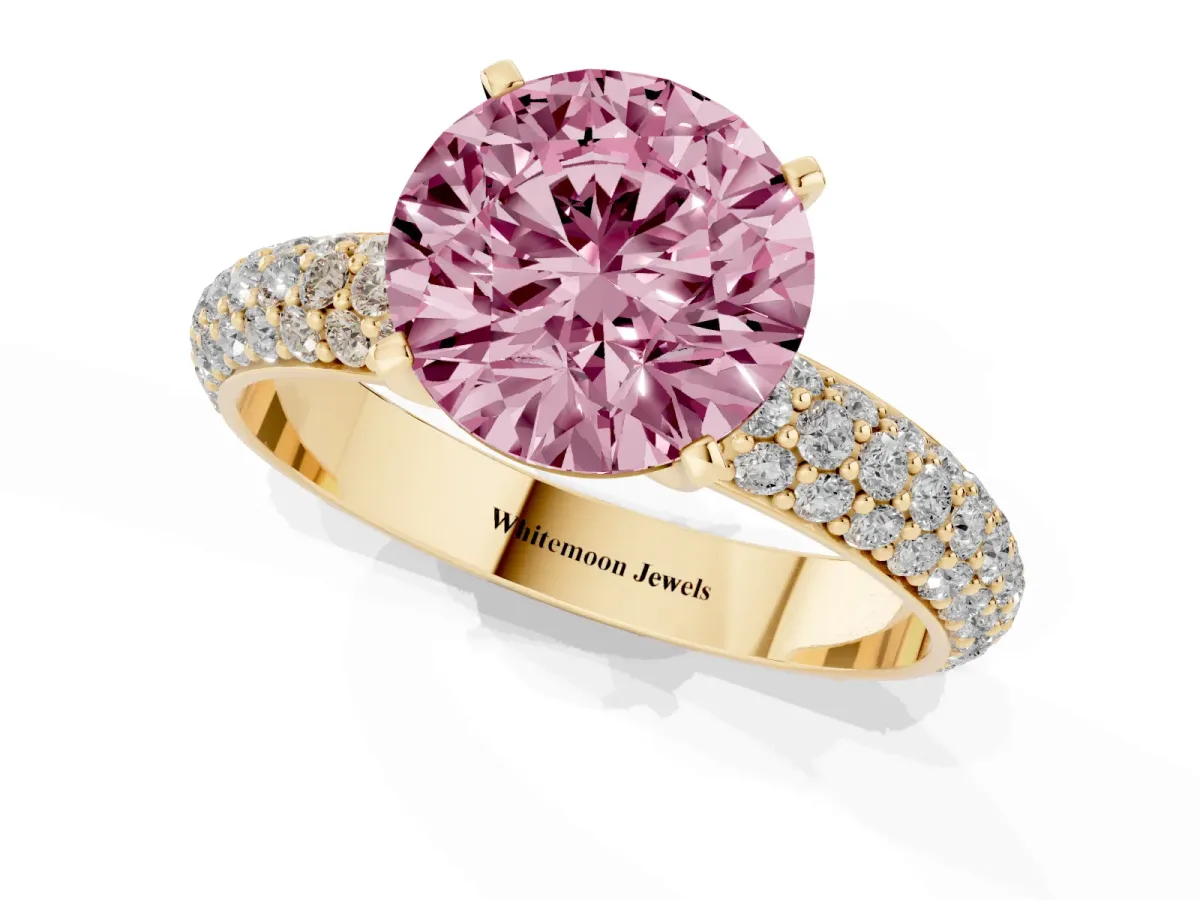 Fancy Pink Round Cut Diamond Solitaire Ring with Prong Setting and Pavé Band Yellow gold