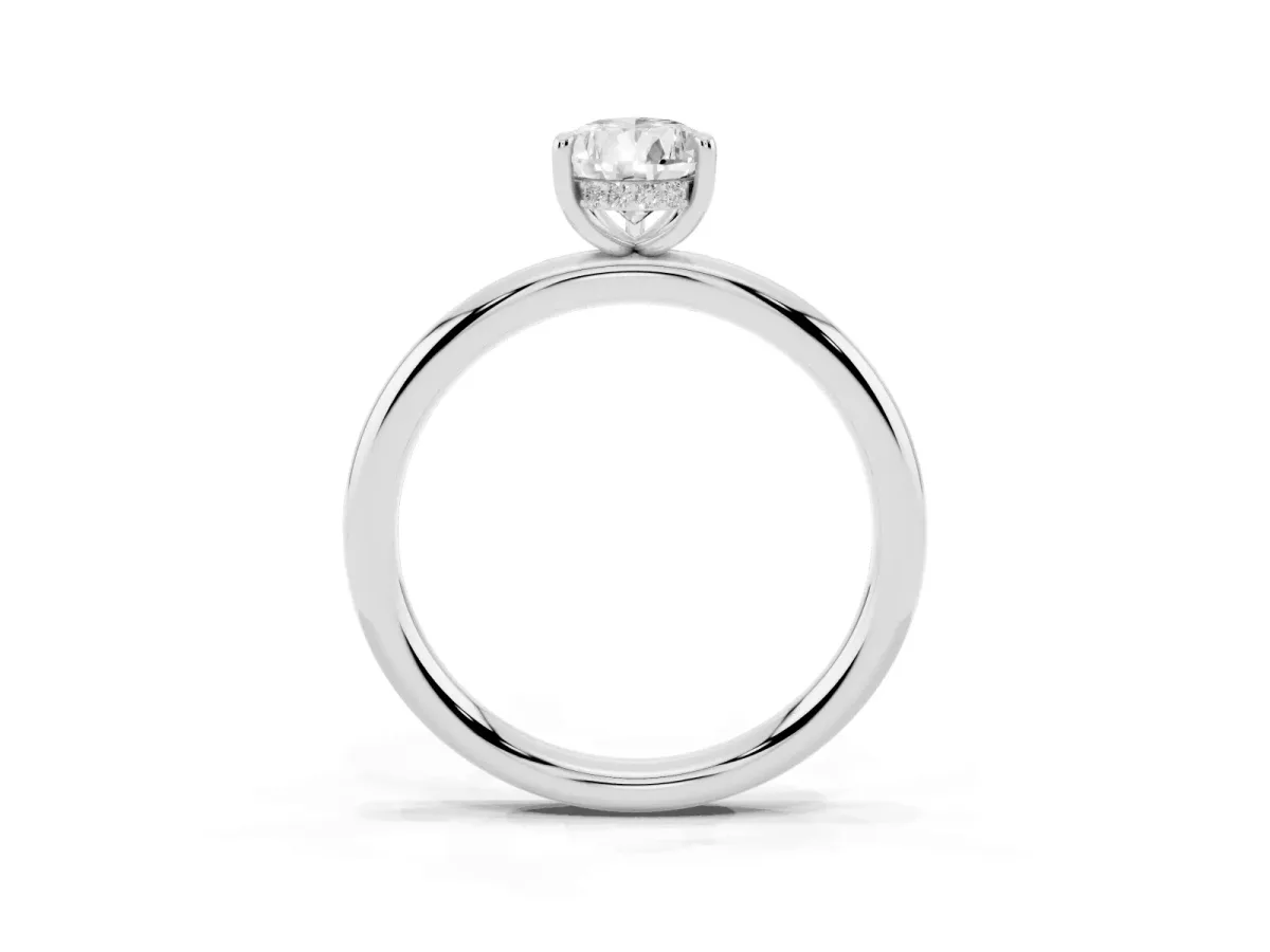 Pear Cut Diamond Solitaire Ring with Thin Band and Four-Prong Setting Silver