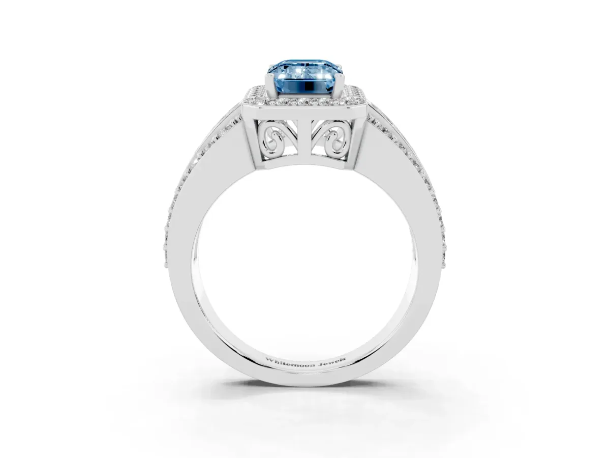 Fancy Blue Emerald Cut Halo Diamond Ring with Round Split Shank and Prong Setting Platinum