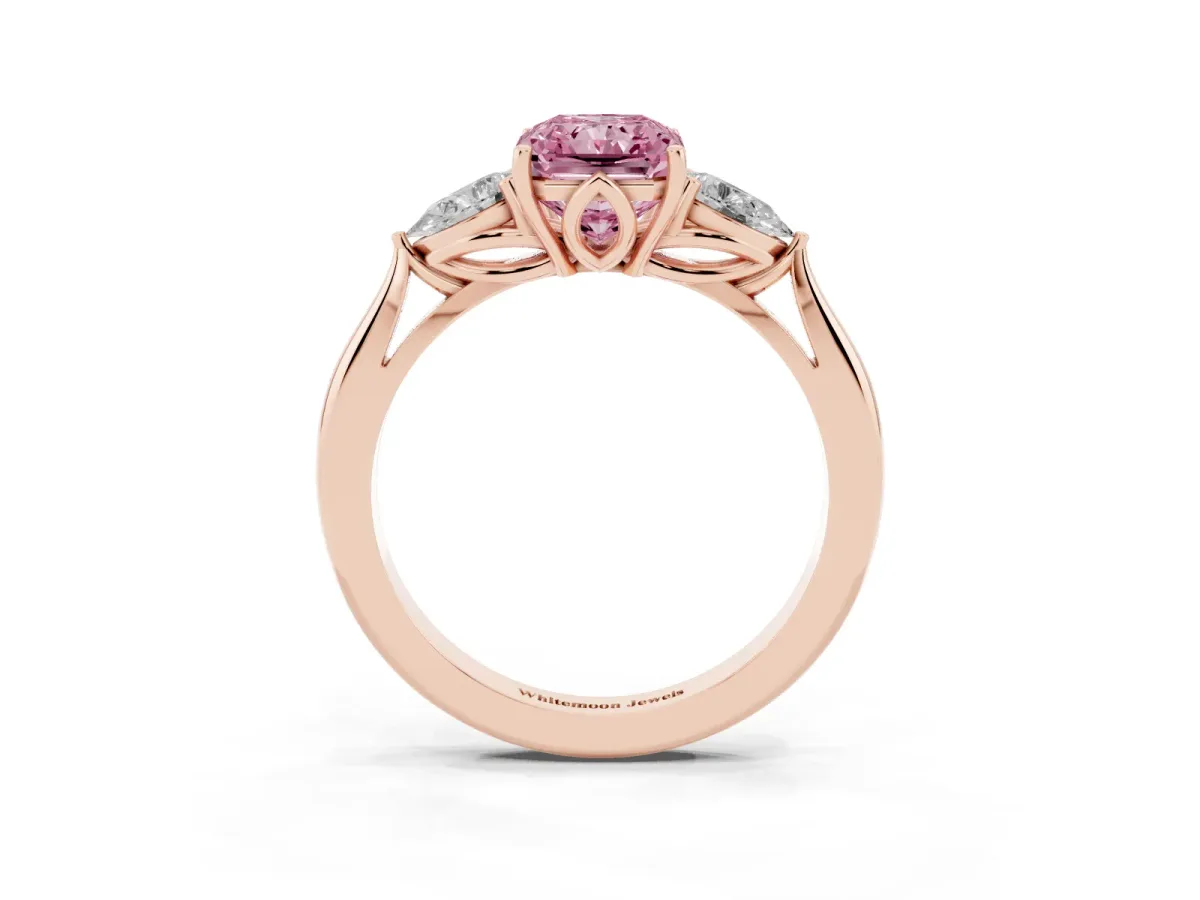 Fancy Pink Three-Stone Radiant Cut Diamond Ring with Pear Side Stones in Four-Prong Setting Rose gold