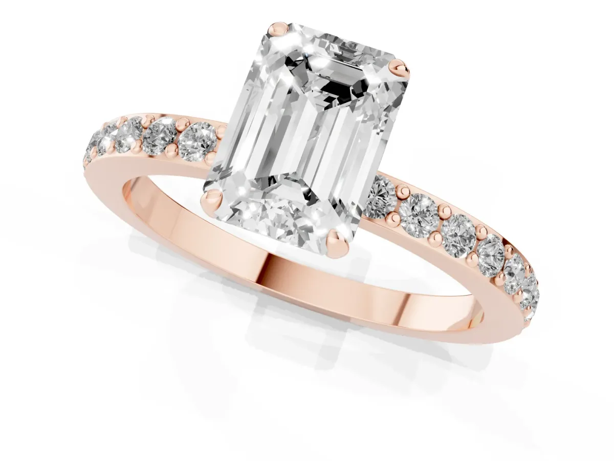 Emerald Cut Diamond Solitaire Engagement Ring with Pavé Band and Four-Prong Setting Rose gold
