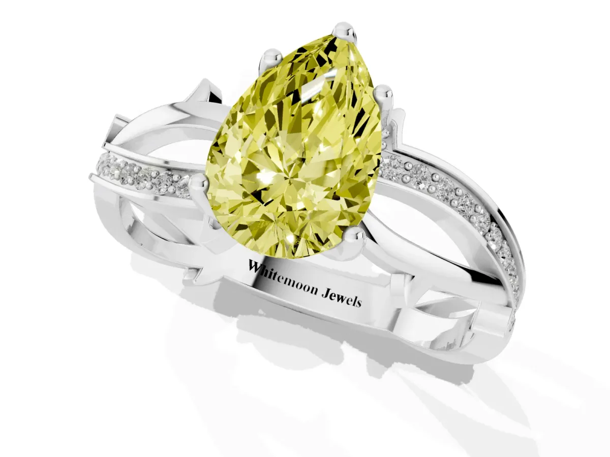 Fancy Yellow Pear Cut Solitaire Twist Band with Pavé Accents and Four-Prong Setting Platinum