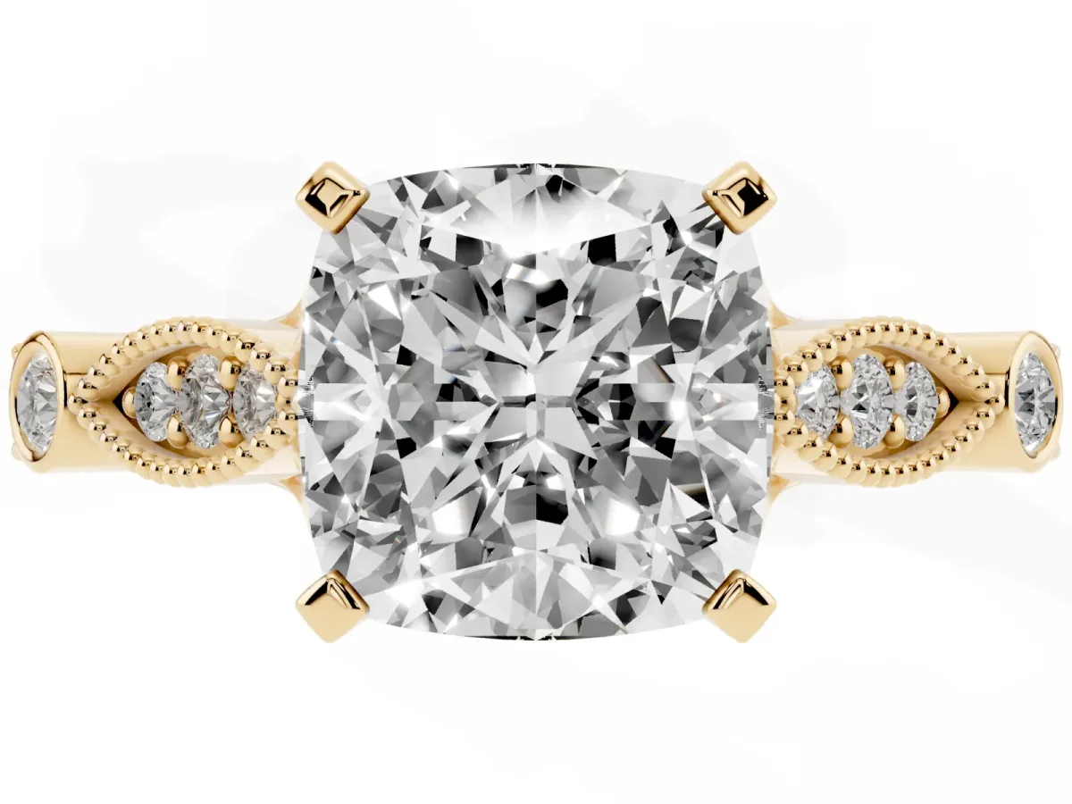 Cushion Cut Cut Diamond with Milgrain Marquise and Bezel Accents on a Solitaire Band with Prong Setting Yellow gold