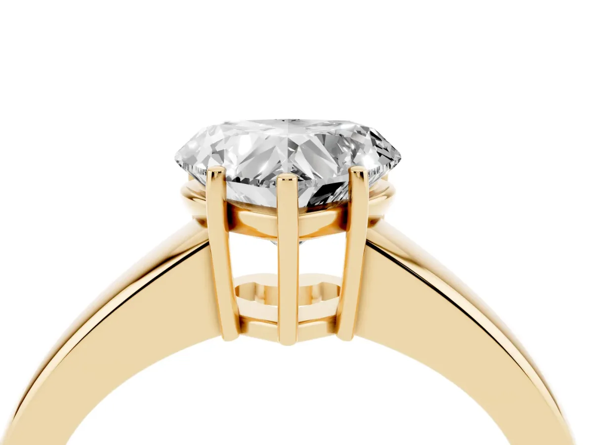 Heart Cut Solitaire Diamond Ring with Tapered Band and Four-Prong Setting Yellow gold