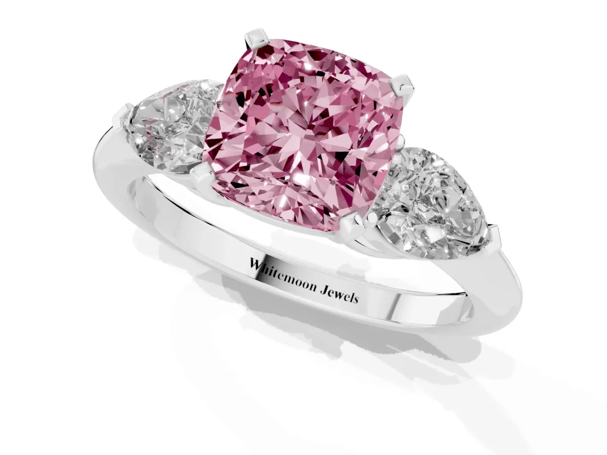 Fancy Pink Three-Stone Cushion Cut Diamond Ring with Pear Side Stones and Four-Prong Setting Silver