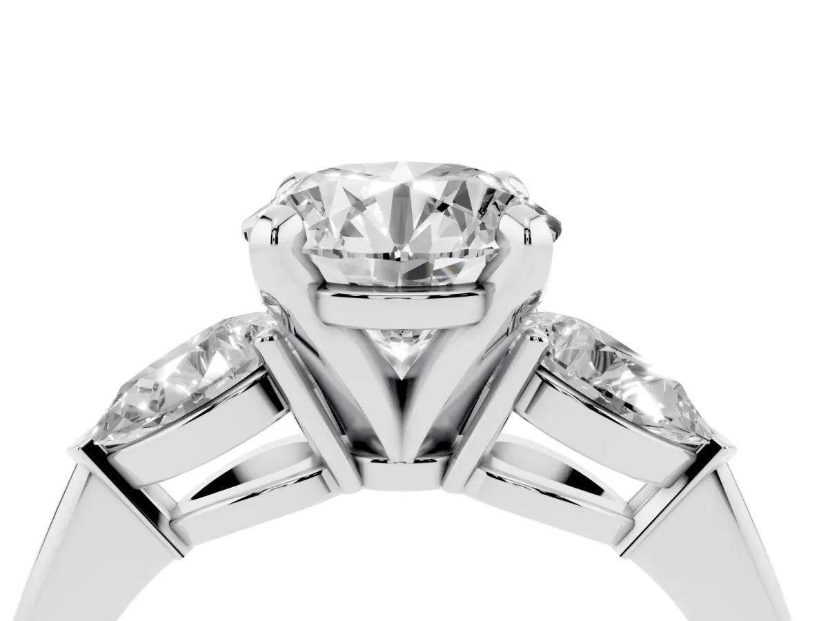 Three-Stone Round Cut Diamond Ring with Pear Side Stones and Four-Prong Setting Silver