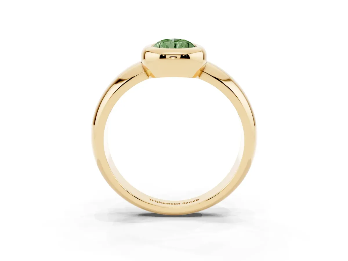 Fancy Green Bezel Set Pear Cut Solitaire Ring with Wide Band Yellow gold