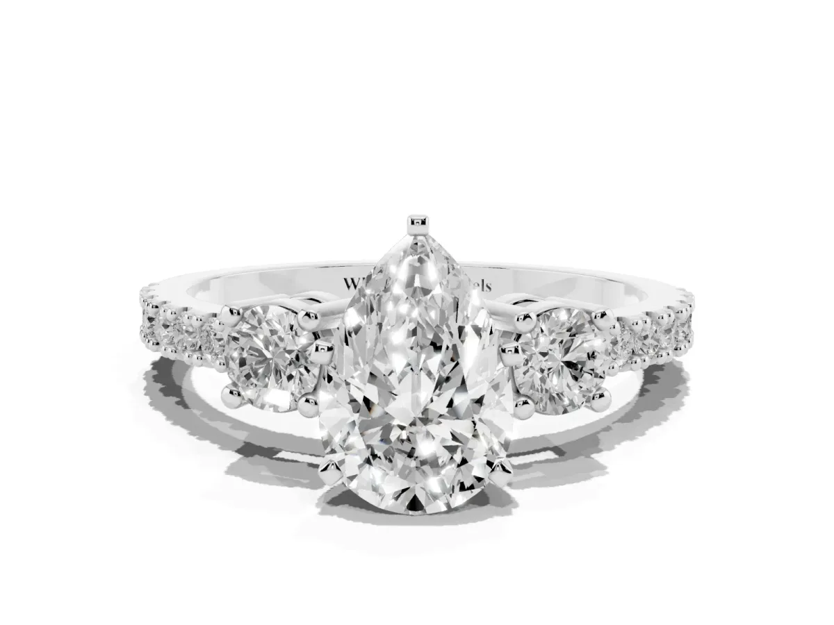 Pear Cut Three-Stone Diamond Pavé Band with Prong Setting Platinum