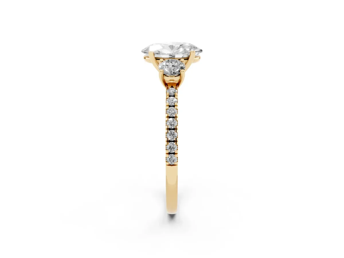 Three-Stone Oval Cut Cut Diamond Pavé Band with Prong Setting Yellow gold
