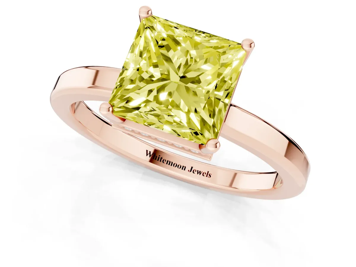 Fancy Yellow Princess Cut Cut Solitaire Engagement Ring with Four-Prong Setting on a Classic Band Rose gold