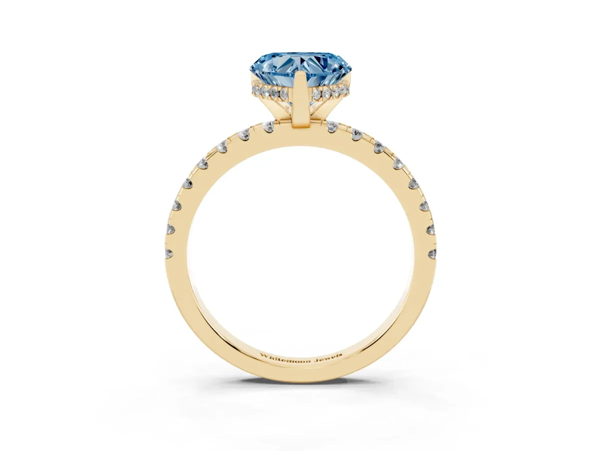 Fancy Blue Heart Cut Diamond Solitaire Ring with Round Pavé Band and Four-Prong Setting Yellow gold