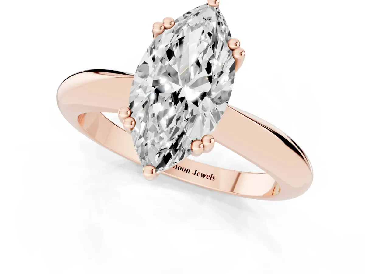 Marquise Cut Cut Solitaire Engagement Ring with Tapered Band and Four-Prong Setting Rose gold