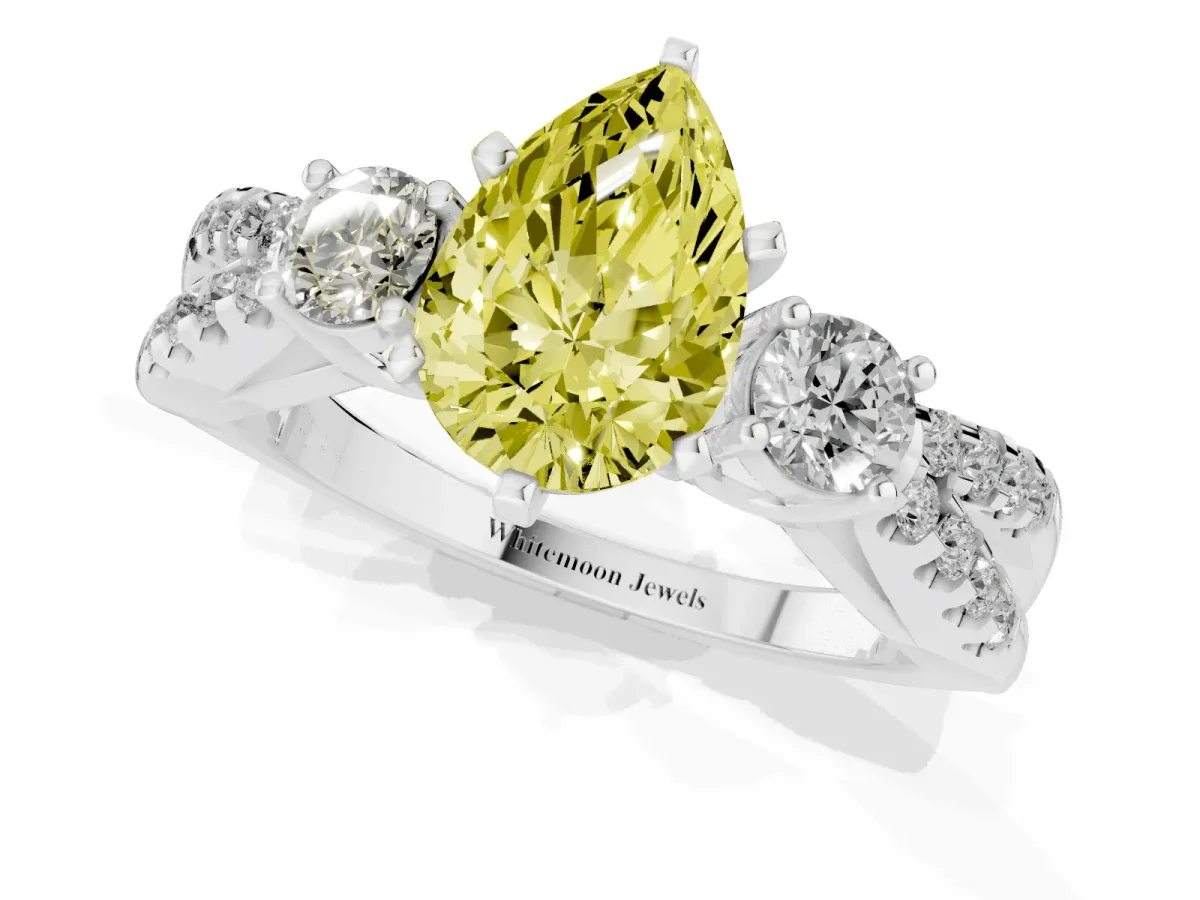 Fancy Yellow Pear Cut Diamond Three-Stone Ring with Pavé Split Shank and Four-Prong Setting Silver