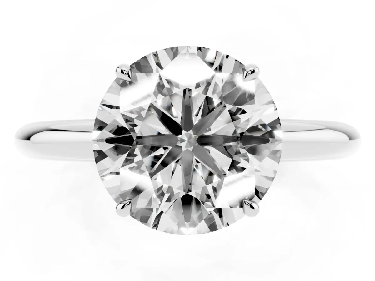Round Cut Brilliant Solitaire Engagement Ring with Six-Prong Setting and Classic Band White gold
