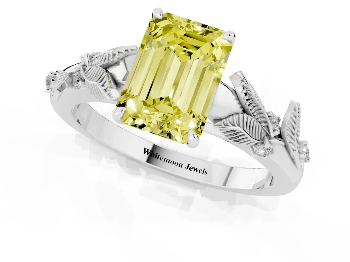 Fancy Yellow Emerald Cut Diamond Solitaire Ring with Leaf Motif Band and Four-Prong Setting Silver