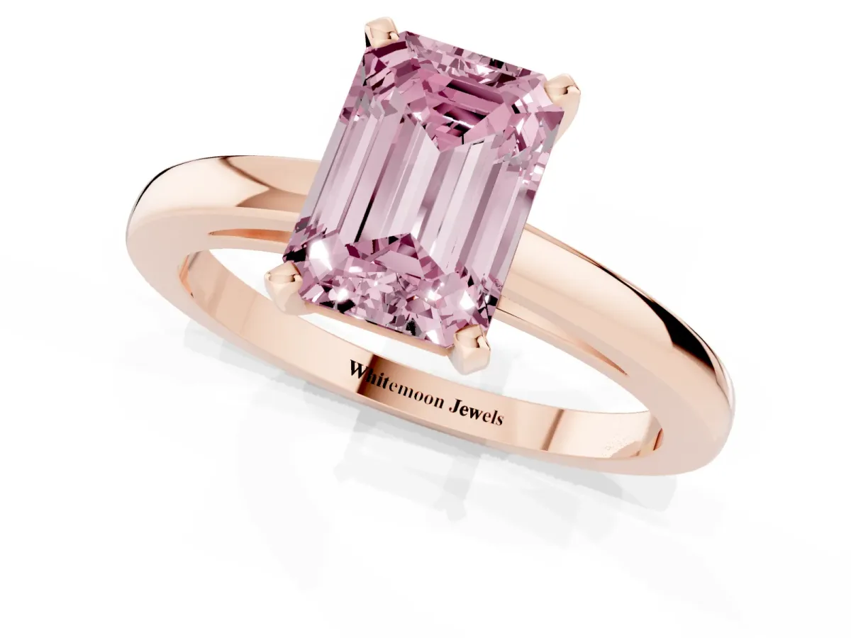 Fancy Pink Emerald Cut Solitaire Diamond Engagement Ring with Four-Prong Setting on a Classic Band Rose gold