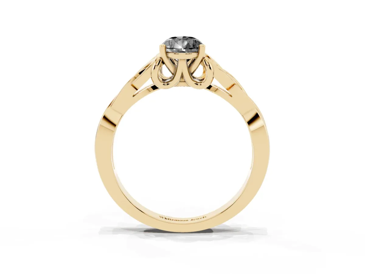 Fancy Black Pear Cut Diamond Solitaire Engagement Ring with Celtic Knot Band and Four-Prong Setting Yellow gold