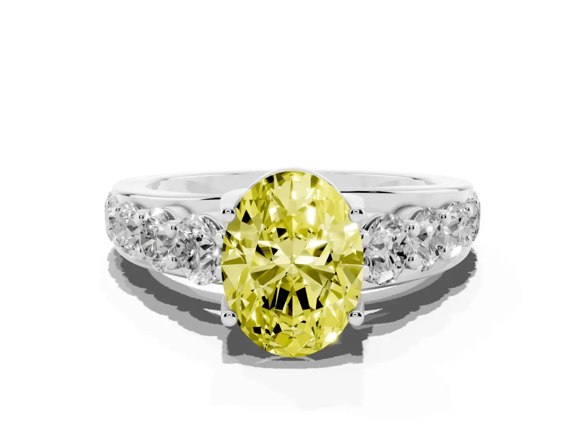 Fancy Yellow Oval Cut Diamond Engagement Ring with Pavé Band and Four-Prong Setting Silver