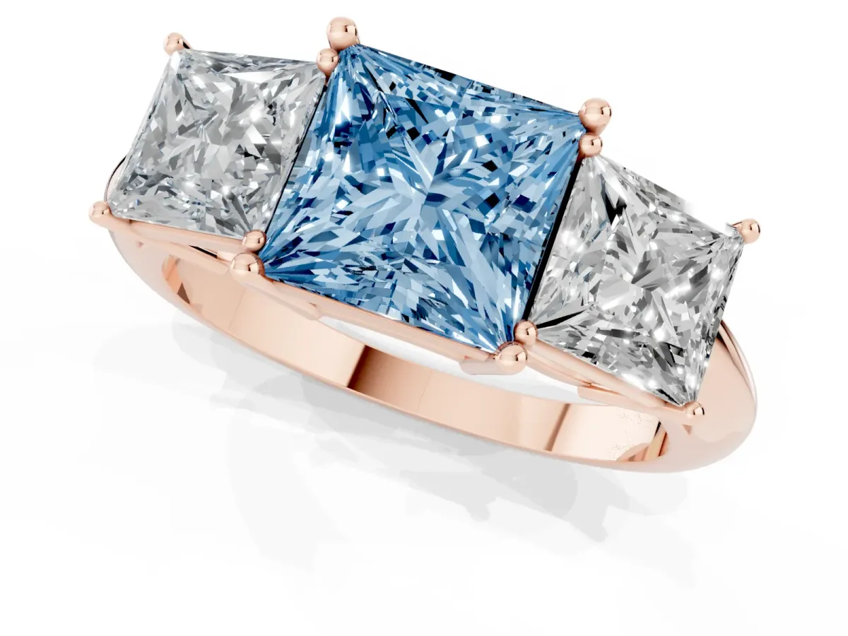 Fancy Blue Three-Stone Princess Cut Cut Diamond Engagement Ring with Prong Setting on a White Gold Band Rose gold
