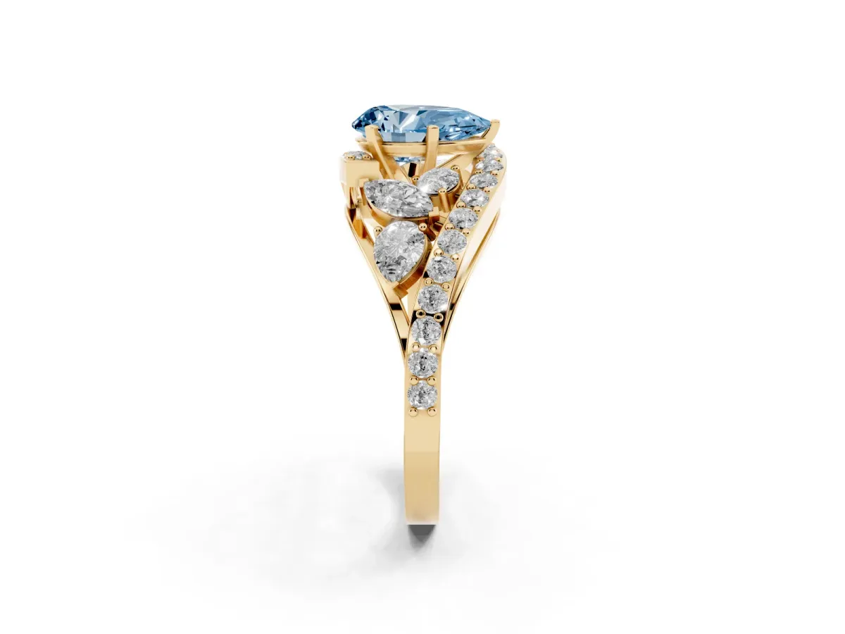 Fancy Blue Pear Cut Diamond Halo Ring with Marquise and Pavé Band in Prong Setting Yellow gold