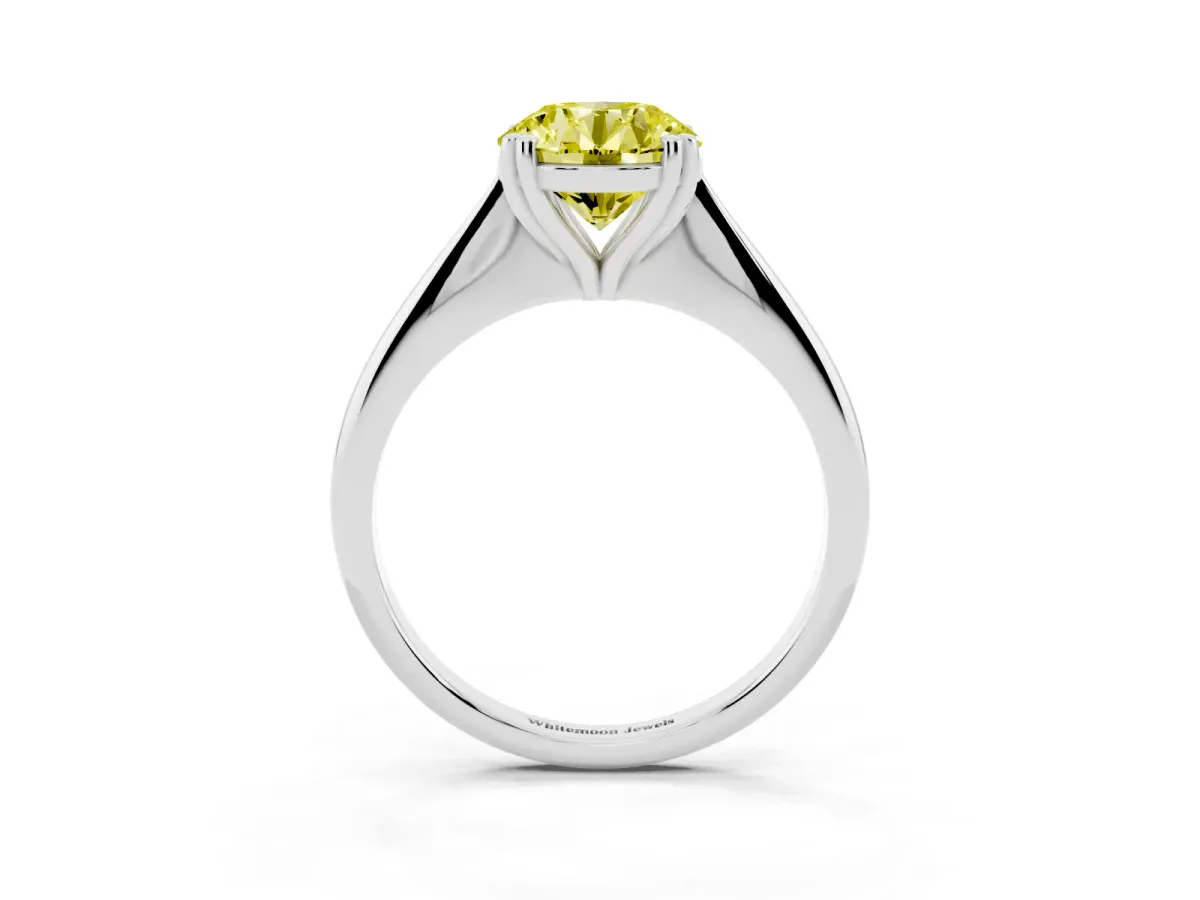 Fancy Yellow Round Cut Solitaire Diamond Ring with Six-Prong Setting and Classic Band Silver