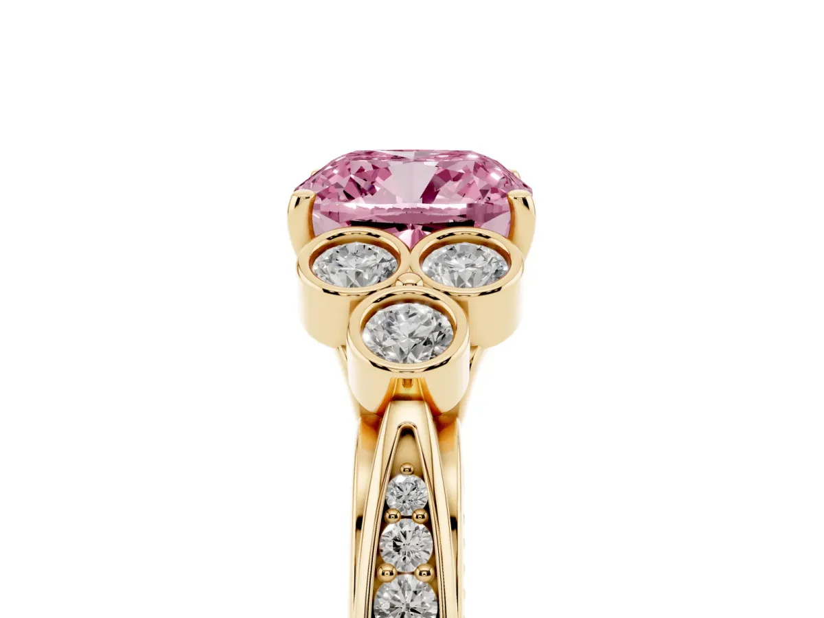 Fancy Pink Cushion Cut Cut Diamond Engagement Ring with Bezel Set Round Side Stones and Prong Setting Yellow gold