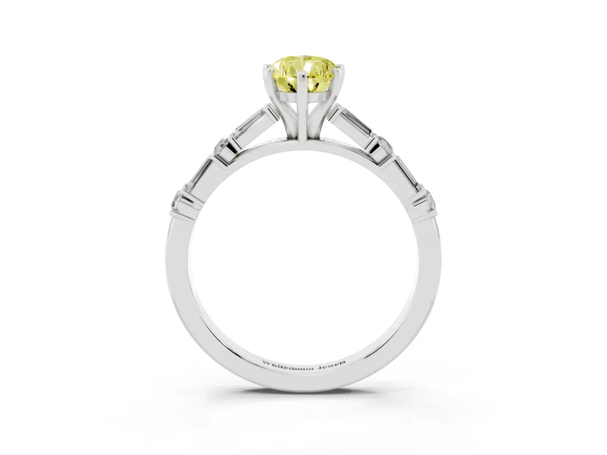 Fancy Yellow Pear Cut Diamond Solitaire with Side Baguettes and Channel Set Band Silver