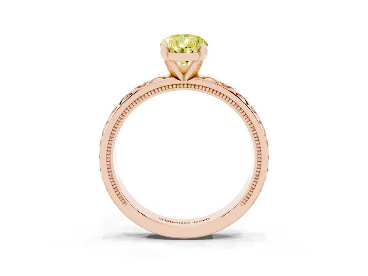 Fancy Yellow Pear Cut Solitaire Diamond Engagement Ring with XO Engraved Band and Four-Prong Setting Rose gold