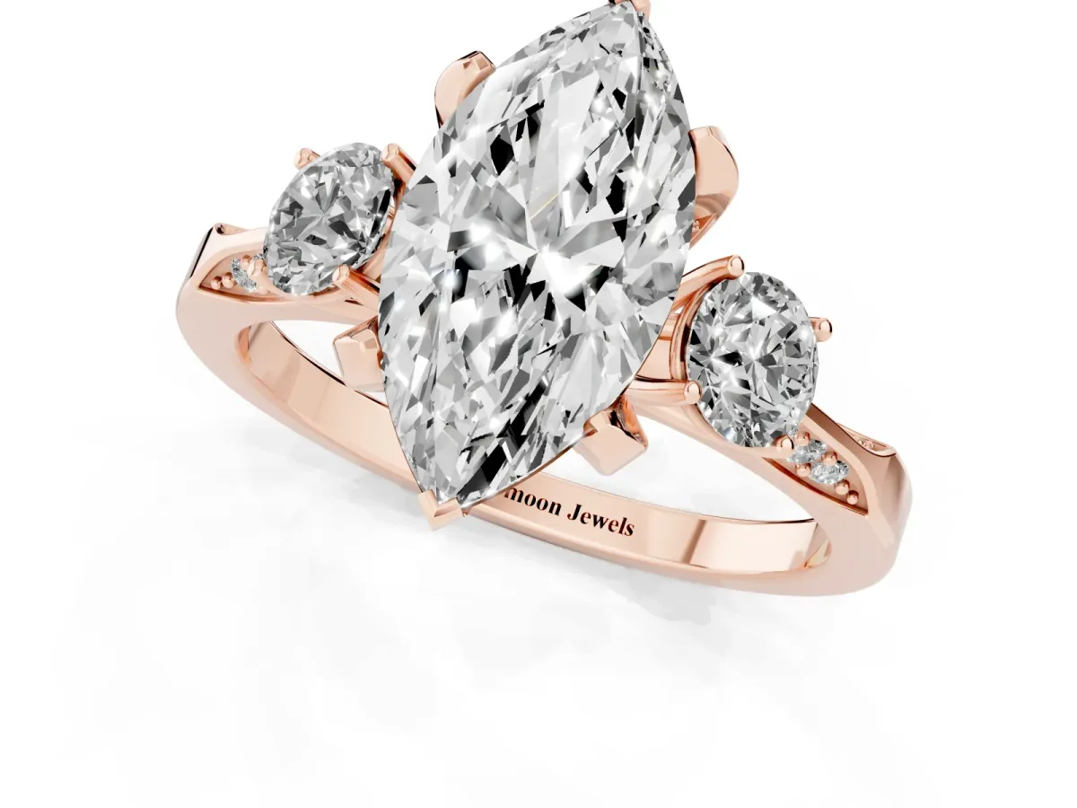 Marquise Cut Brilliant Three-Stone Diamond Ring with Pavé Band and Four-Prong Setting Rose gold