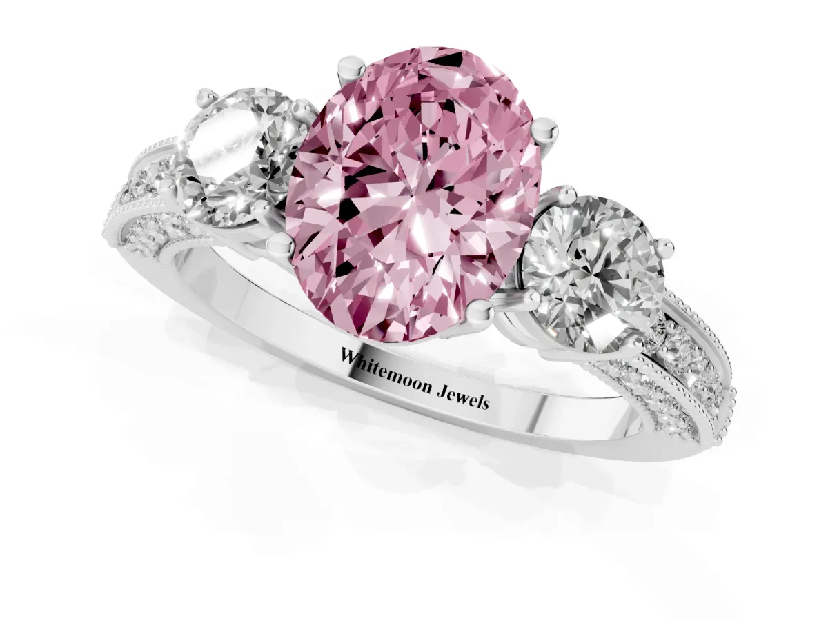 Fancy Pink Oval Cut Three-Stone Diamond Ring with Pavé Band and Four-Prong Setting Silver