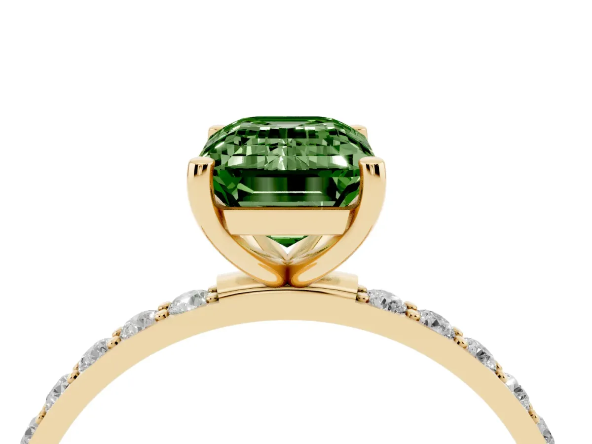 Fancy Green Emerald Cut Diamond Solitaire Ring with Round Pavé Shoulders and Prong Setting Yellow gold